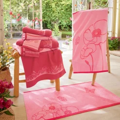 Couché dans les fleurs 2 gants de toilette