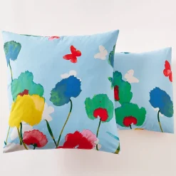 Couché dans les fleurs Taie d'oreiller