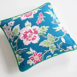 Un oiseau sur la branche Housse de coussin